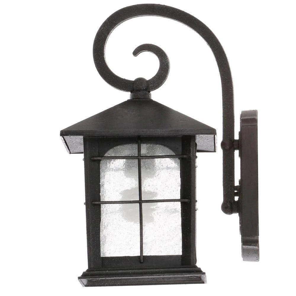 Home Decorators Collection Brimfield 12.75 in. Aged Iron 1 Light Outdoor Wall Lantern with Clear Seedy Glass Shade 5 Home Decorators Collection Brimfield 12.75 in. Aged Iron 1 Light Outdoor Wall Lantern with Clear Seedy Glass Shade - Image 3