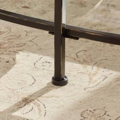 Home Decorators Collection Bella 46 in. Antique Bronze/Clear Large Oval Glass Coffee Table with Shelf -Flora Home Decorators Soldes antique bronze home decorators collection coffee tables v183102xxb np 1d 1000