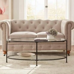 Home Decorators Collection Bella 46 in. Antique Bronze/Clear Large Oval Glass Coffee Table with Shelf