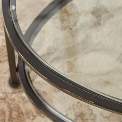 Home Decorators Collection Bella 46 in. Antique Bronze/Clear Large Oval Glass Coffee Table with Shelf -Flora Home Decorators Soldes antique bronze home decorators collection coffee tables v183102xxb np a0 1000