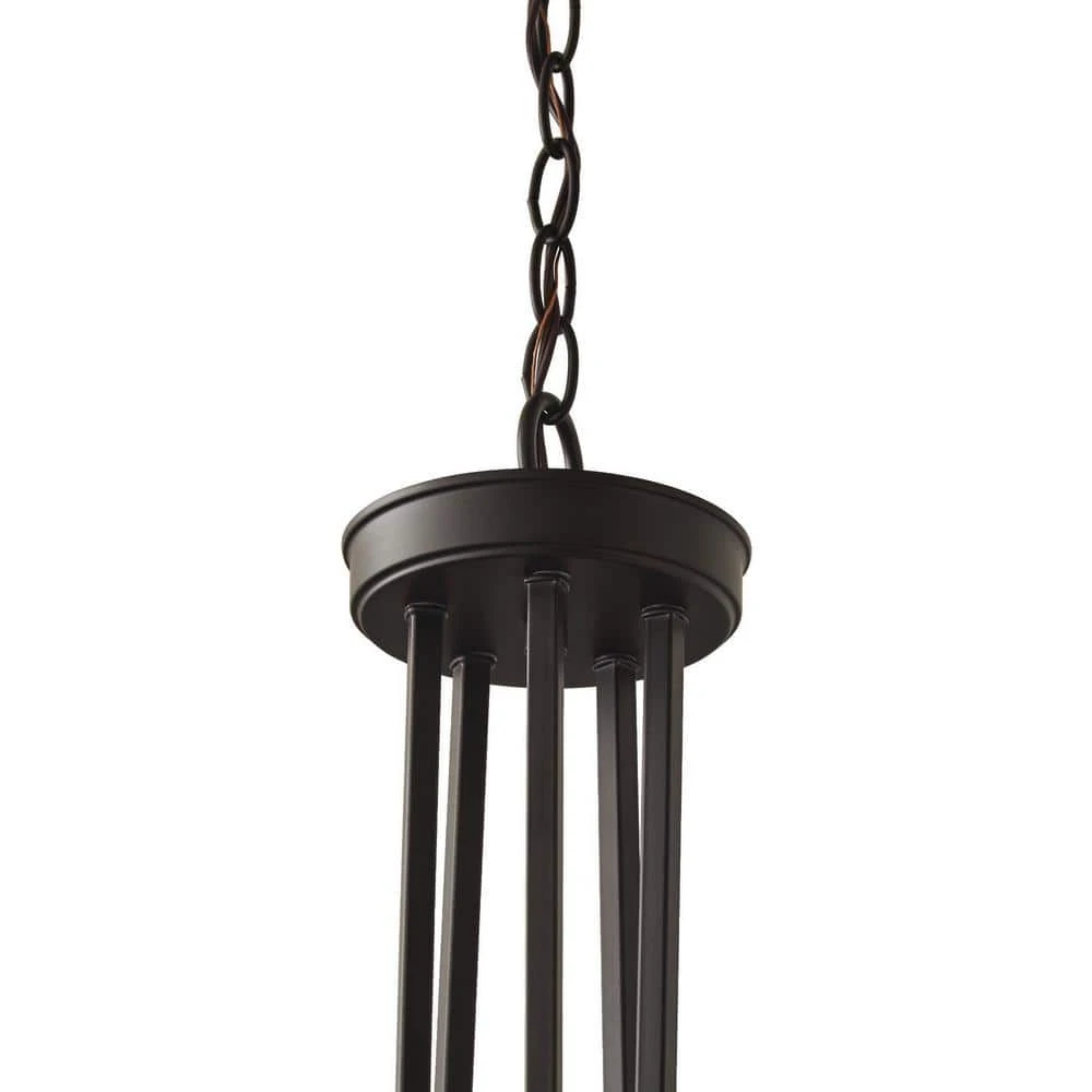 Home Decorators Collection Knollwood 30 in. 5-Light Blackened Bronze Industrial Round Chandelier with Brass Accents and Clear Glass Shades 7 Home Decorators Collection Knollwood 30 in. 5-Light Blackened Bronze Industrial Round Chandelier with Brass Accents and Clear Glass Shades - Image 5