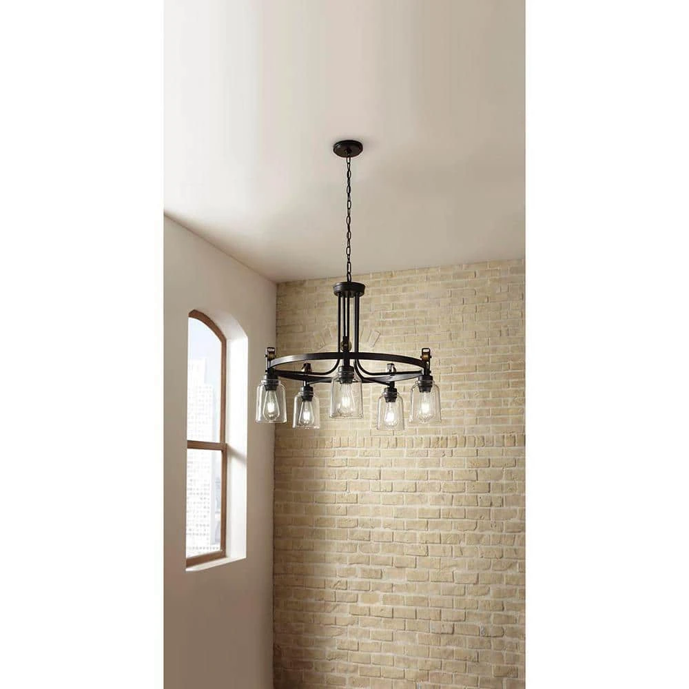 Home Decorators Collection Knollwood 30 in. 5-Light Blackened Bronze Industrial Round Chandelier with Brass Accents and Clear Glass Shades 6 Home Decorators Collection Knollwood 30 in. 5-Light Blackened Bronze Industrial Round Chandelier with Brass Accents and Clear Glass Shades - Image 4
