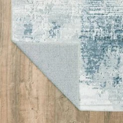 Home Decorators Collection Harmony Machine Washable Blue 7 ft. 6 in. x 10 ft. Abstract Polyester Indoor Area Rug -Flora Home Decorators Soldes blue home decorators collection area rugs 592463 66 1000