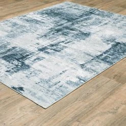 Home Decorators Collection Harmony Machine Washable Blue 7 ft. 6 in. x 10 ft. Abstract Polyester Indoor Area Rug -Flora Home Decorators Soldes blue home decorators collection area rugs 592463 c3 1000
