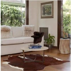 Home Decorators Collection Natural Cowhide Brown and White 5 ft. x 7 ft. Animal Shape Area Rug -Flora Home Decorators Soldes brown and white home decorators collection area rugs v301000001brwh e1 1000