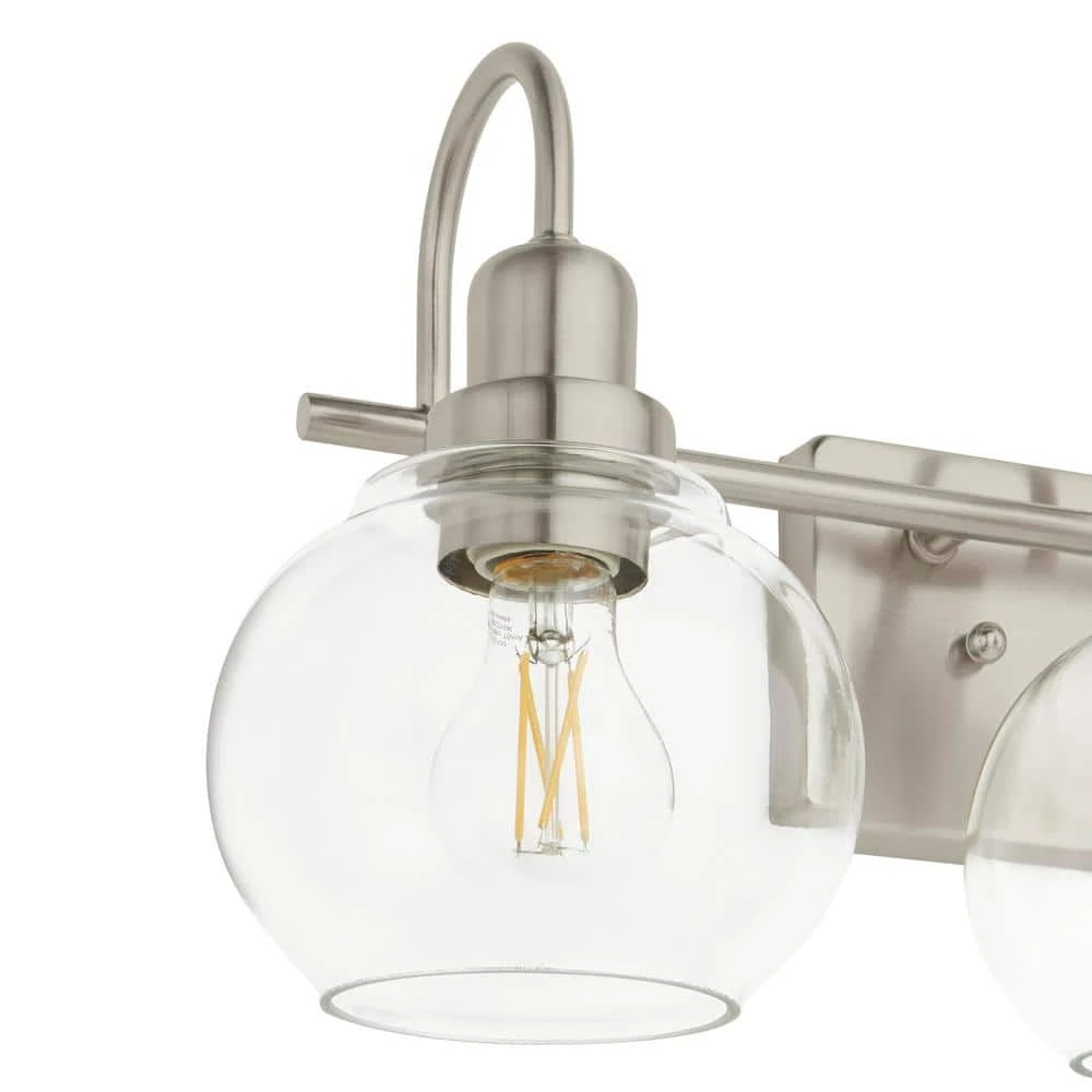 Home Decorators Collection Halyn 23 in. 3-Light Brushed Nickel Bathroom Vanity Light with Clear Glass Shades 6 Home Decorators Collection Halyn 23 in. 3-Light Brushed Nickel Bathroom Vanity Light with Clear Glass Shades - Image 4