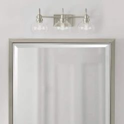 Home Decorators Collection Halyn 23 in. 3-Light Brushed Nickel Bathroom Vanity Light with Clear Glass Shades 16 Home Decorators Collection Halyn 23 in. 3-Light Brushed Nickel Bathroom Vanity Light with Clear Glass Shades -Flora Home Decorators Soldes brushed nickel home decorators collection vanity lighting 1019hdcbndi e1 1000
