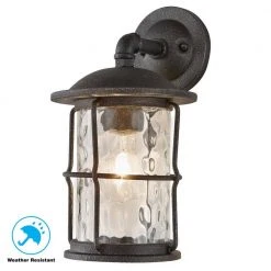 Home Decorators Collection Hargreaves 7-1/2 in. One-Light Black Rustic Farmhouse Outdoor Wall Lantern Sconce with Seeded Glass -Flora Home Decorators Soldes gilded iron home decorators collection outdoor sconces 7956hdcgidi 66 1000