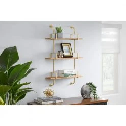 Home Decorators Collection Gold Metal and Natural Wood Wall Shelf (21 in. W x 34 in. H) 8 Home Decorators Collection Gold Metal and Natural Wood Wall Shelf (21 in. W x 34 in. H) -Flora Home Decorators Soldes gold nature home decorators collection decorative shelving 99kg107k8n e1 1000