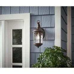 Home Decorators Collection Leeds 16 in. 1-Light Mystic Bronze Outdoor Wall Lamp with Clear Water Glass Shade -Flora Home Decorators Soldes mystic bronze home decorators collection outdoor sconces hb7262a 293 e1 1000