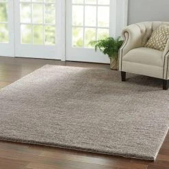 Home Decorators Collection Ethereal Shag Taupe 7 ft. x 10 ft. Indoor Area Rug -Flora Home Decorators Soldes taupe home decorators collection area rugs 509972 e1 1000