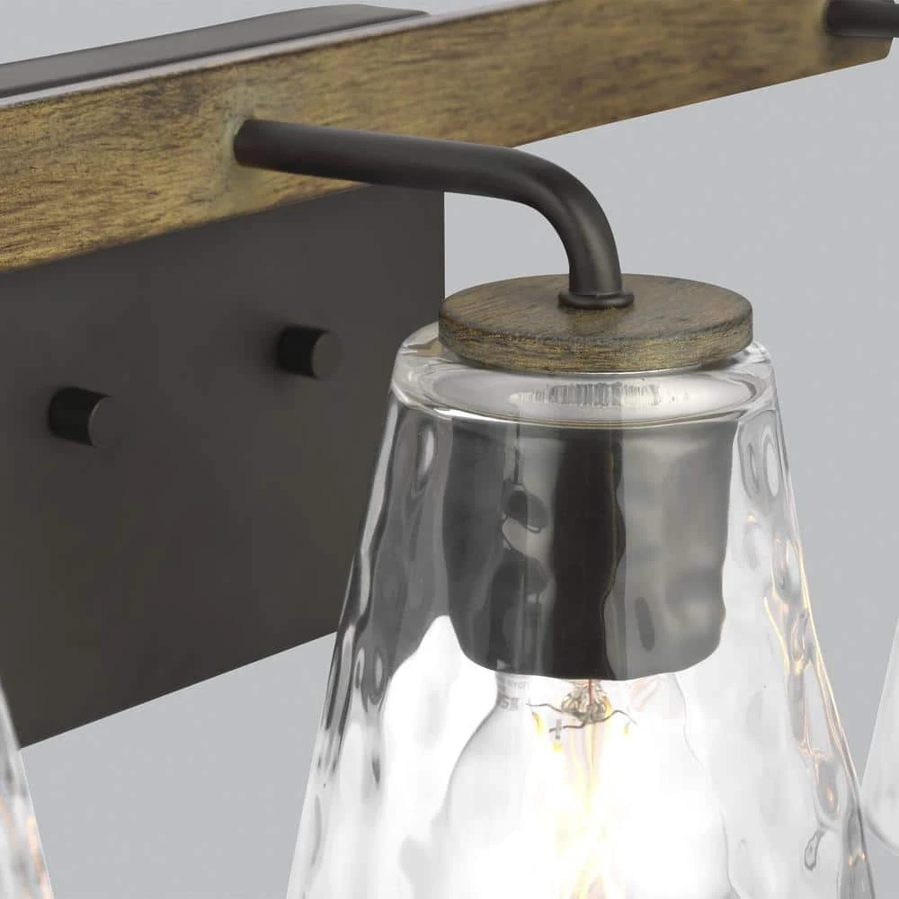 Home Decorators Collection Westbrook 3-Light Weathered Oak Rustic Farmhouse Bathroom Vanity Light with Matte Black Accents 4 Home Decorators Collection Westbrook 3-Light Weathered Oak Rustic Farmhouse Bathroom Vanity Light with Matte Black Accents - Image 2