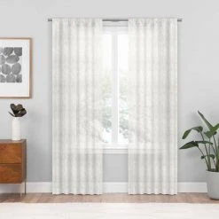Home Decorators Collection White Geometric Rod Pocket Sheer Curtain - 54 in. W x 84 in. L